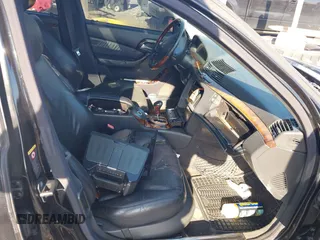 2004 Mercedes-Benz S-Class 5.0L with VIN WDBNG75J24A414813, listed as a IAAI auction lot 41911565 with 999,999 mi miles. Bid and sale history available at carsss.com. Image 5.