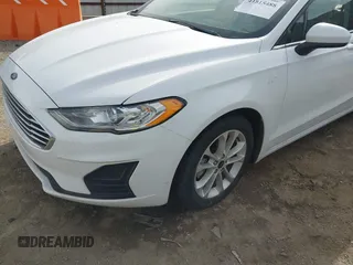 2020 Ford Fusion Hybrid SE with VIN 3FA6P0LU7LR201375, listed as a IAAI auction lot 41815488 with 70,670 mi miles. Bid and sale history available at carsss.com. Image 18.