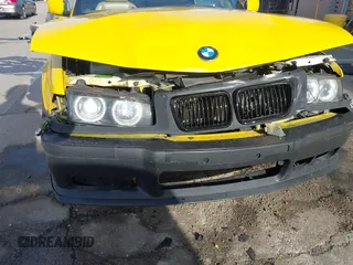 1997 BMW 3-Series 328IC with VIN WBABK8323VET99797, listed as a IAAI auction lot 41616423 with 177,621 mi miles. Bid and sale history available at carsss.com. Image 6.