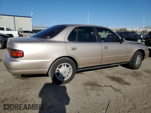 1994 Toyota Camry XLE with VIN JT2GK13E0R0017831, listed as a Copart auction lot 49887485 with 143,303 mi miles and Salvage Title. Bid and sale history available at carsss.com. Image 3.