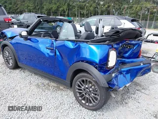 2025 MINI Convertible with VIN WMW23GX01S2X08664, listed as a IAAI auction lot 42506008 with 1,641 mi miles and . Bid and sale history available at DreamBid. Image 3.