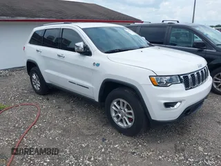 2019 Jeep Grand Cherokee Laredo E with VIN 1C4RJFAG0KC527864, listed as a IAAI auction lot 42652419 with 115,282 mi miles and . Bid and sale history available at DreamBid. Image 1.