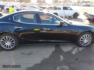 2014 Maserati Ghibli S Q4 with VIN ZAM57RTA2E1086046, listed as a IAAI auction lot 41846389 with 55,984 mi miles. Bid and sale history available at carsss.com. Image 13.