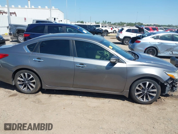 2016 Nissan Altima SR z VIN 1N4AL3AP5GC121498, wystawiony jako IAAI lot #41965883 z przebiegiem 128 381 mil mil oraz . Historia ofert i sprzedaży dostępna na DreamBid. Obrazek 14.