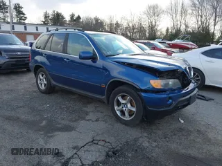2001 BMW X5 4.4i with VIN WBAFB33501LH24719, listed as a IAAI auction lot 41055076 with 126,530 mi miles. Bid and sale history available at carsss.com. Image 1.