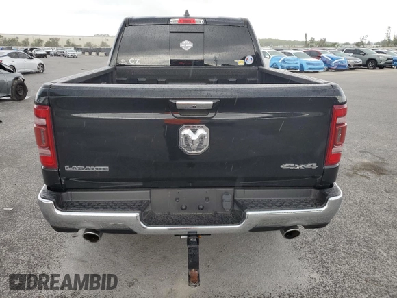 2022 Ram 1500 Laramie with VIN 1C6SRFJT4NN300006, listed as a Copart auction lot 54976775 with 61,436 mi miles and Salvage title. Bid and sale history available at DreamBid. Image 6.