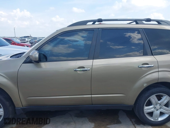 2009 Subaru Forester X Limited z VIN JF2SH64699H745428, wystawiony jako IAAI lot #42407890 z przebiegiem 131 716 mil mil oraz . Historia ofert i sprzedaży dostępna na DreamBid. Obrazek 14.