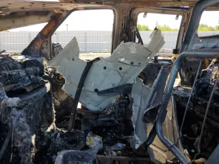2004 Ford Econoline Passenger XL with VIN 1FBSS31L54HB38576, listed as a Copart auction lot 55880145 with Not provided miles and Salvage title. Bid and sale history available at DreamBid. Image 7.