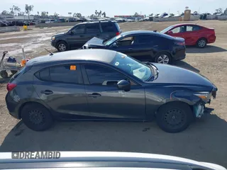 2017 Mazda 3 Sport with VIN 3MZBN1K76HM101415, listed as a IAAI auction lot 42012311 with 222,246 mi miles. Bid and sale history available at carsss.com. Image 14.