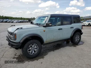 2023 Ford Bronco z VIN 1FMEE5DP8PLB29801, wystawiony jako Copart lot #55086715 z przebiegiem 14 826 mil mil oraz Szkoda całkowita • Salvage title. Historia ofert i sprzedaży dostępna na DreamBid. Obrazek 1.