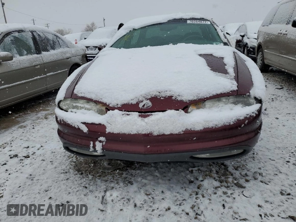 1999 Oldsmobile Aurora with VIN 1G3GR62C8X4113745, listed as a Copart auction lot 60573923 with 177,809 mi miles and Salvage Title. Bid and sale history available at DreamBid. Image 5.