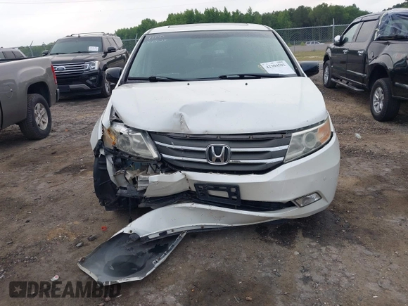 2012 Honda Odyssey Touring with VIN 5FNRL5H93CB034485, listed as a IAAI auction lot 42304502 with 198,589 mi miles and . Bid and sale history available at DreamBid. Image 12.