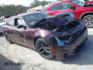 2021 Dodge Charger GT with VIN 2C3CDXHG4MH667025, listed as a IAAI auction lot 41602696 with 77,503 mi miles and . Bid and sale history available at DreamBid. Image 13.