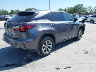 2019 Lexus RX with VIN 2T2ZZMCA0KC132043, listed as a IAAI auction lot 42001021 with 23,663 mi miles. Bid and sale history available at carsss.com. Image 4.