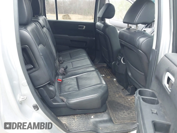 2012 Honda Pilot EX-L with VIN 5FNYF4H5XCB051133, listed as a IAAI auction lot 41907624 with 202,244 mi miles and . Bid and sale history available at carsss.com. Image 8.