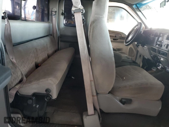 1999 Ford F-250 XL with VIN 1FTNX20FXXEE59499, listed as a Copart auction lot 87511735 with 215,520 mi miles and Salvage title. Bid and sale history available at DreamBid. Image 11.