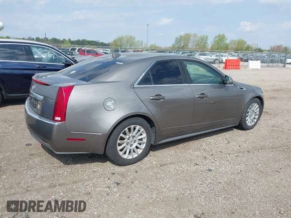 2012 Cadillac CTS Luxury with VIN 1G6DE5E56C0132613, listed as a IAAI auction lot 42116862 with 81,617 mi miles and . Bid and sale history available at DreamBid. Image 4.