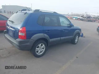 2008 Hyundai Tucson SE with VIN KM8JN12D58U860889, listed as a IAAI auction lot 41884642 with 236,648 mi miles. Bid and sale history available at carsss.com. Image 4.