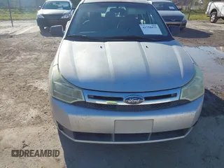 2009 Ford Focus S with VIN 1FAHP34N79W221813, listed as a IAAI auction lot 41758471 with 248,531 mi miles. Bid and sale history available at carsss.com. Image 6.