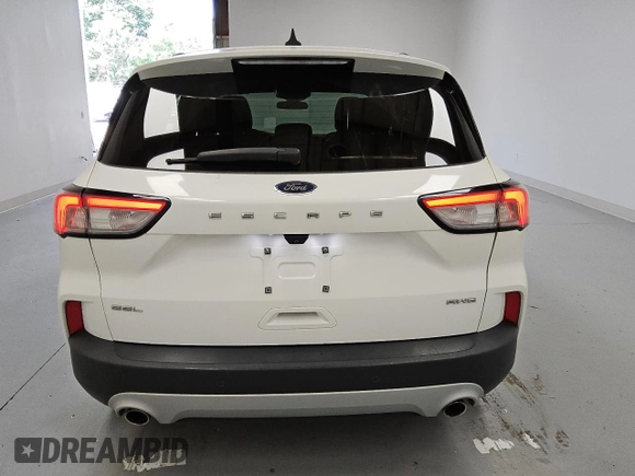 2021 Ford Escape SEL with VIN 1FMCU9H65MUA64074, listed as a Copart auction lot 66462345 with 122,346 mi miles and Clean title. Bid and sale history available at DreamBid. Image 6.