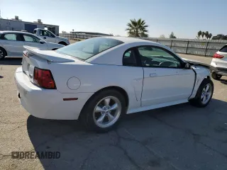 2002 Ford Mustang Standard with VIN 1FAFP40452F182431, listed as a Copart auction lot 79667594 with 66,892 mi miles and Salvage Title. Bid and sale history available at carsss.com. Image 3.