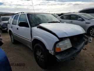 2001 GMC Jimmy SLT with VIN 1GKDT13W412121445, listed as a Copart auction lot 76842164 with 277,068 mi miles and Salvage Title. Bid and sale history available at carsss.com. Image 4.