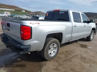 2016 Chevrolet Silverado 1500 LT with VIN 1GCUKREC9GF229979, listed as a IAAI auction lot 41859015 with 110,821 mi miles and . Bid and sale history available at DreamBid. Image 4.