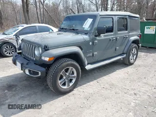 2018 Jeep Wrangler Unlimited Sahara z VIN 1C4HJXEN8JW329816, wystawiony jako IAAI lot #42055851 z przebiegiem 70 298 mil mil oraz . Historia ofert i sprzedaży dostępna na DreamBid. Obrazek 17.