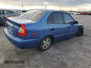2001 Hyundai Accent GL with VIN KMHCG45C91U195735, listed as a Copart auction lot 80950554 with 164,176 mi miles and Salvage Title. Bid and sale history available at carsss.com. Image 3.