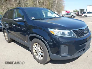 2014 Kia Sorento LX with VIN 5XYKTDA69EG425180, listed as a IAAI auction lot 42125882 with 194,319 mi miles. Bid and sale history available at carsss.com. Image 1.