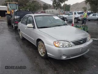 2003 Kia Spectra z VIN KNAFB121135297834, wystawiony jako IAAI lot #42409441 z przebiegiem 84 621 mil mil oraz . Historia ofert i sprzedaży dostępna na DreamBid. Obrazek 1.