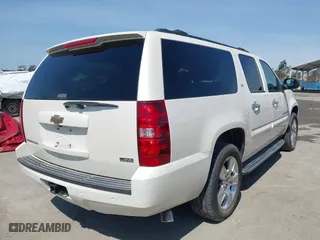 2008 Chevrolet Suburban LTZ with VIN 1GNFC16058R198040, listed as a IAAI auction lot 41421238 with 215,591 mi miles. Bid and sale history available at carsss.com. Image 4.