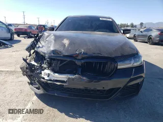 2023 BMW 5 Series M550i xDrive with VIN WBA13BK03PCM44838, listed as a Copart auction lot 68434874 with 17,798 mi miles and Salvage title. Bid and sale history available at DreamBid. Image 5.