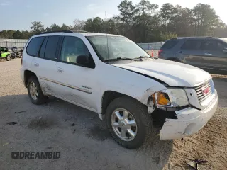 2006 GMC Envoy SLT with VIN 1GKDS13S962230376, listed as a Copart auction lot 43613965 with 136,462 mi miles and Salvage Title. Bid and sale history available at carsss.com. Image 4.