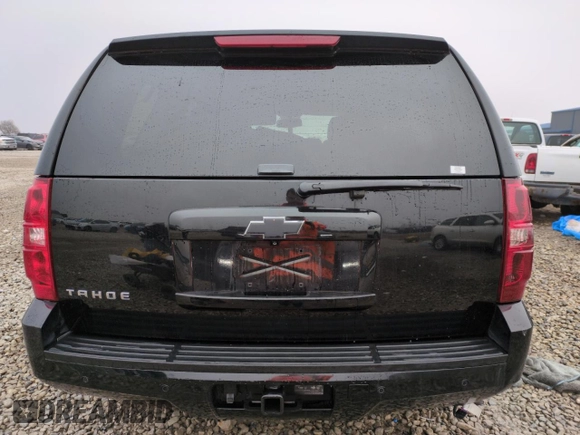 2014 Chevrolet Tahoe LT z VIN 1GNSKBE06ER131287, wystawiony jako Copart lot #82617224 z przebiegiem 138 880 mil mil oraz Szkoda całkowita • Salvage title. Historia ofert i sprzedaży dostępna na DreamBid. Obrazek 6.