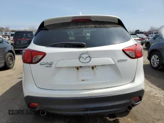 2014 Mazda CX-5 Grand Touring with VIN JM3KE4DY1E0361849, listed as a Copart auction lot 52043465 with 349,688 mi miles and Clean Title. Bid and sale history available at carsss.com. Image 6.
