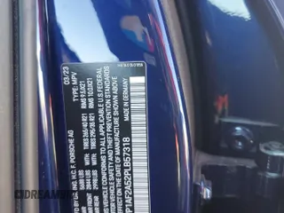 2023 Porsche Macan GTS z VIN WP1AF2A52PLB57318, wystawiony jako Copart lot #70542434 z przebiegiem 10 800 mil mil oraz Szkoda całkowita • Salvage title. Historia ofert i sprzedaży dostępna na DreamBid. Obrazek 13.