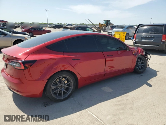2021 Tesla Model 3 Standard Range Plus with VIN 5YJ3E1EA7MF915053, listed as a Copart auction lot 51172815 with 69,303 mi miles and Salvage Title. Bid and sale history available at DreamBid. Image 3.