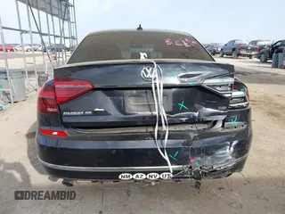 2017 Volkswagen Passat 1.8T SE w/Technology with VIN 1VWGT7A36HC074702, listed as a IAAI auction lot 41805024 with 124,857 mi miles. Bid and sale history available at carsss.com. Image 16.