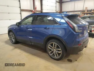 2023 Cadillac XT4 AWD Sport z VIN 1GYFZFR47PF153453, wystawiony jako Copart lot #56988695 z przebiegiem 67 533 mil mil oraz Szkody całkowita. Historia ofert i sprzedaży dostępna na DreamBid. Obrazek 2.