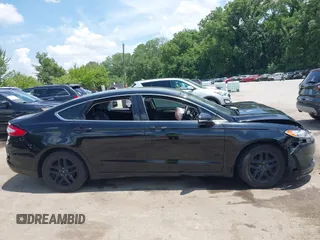 2016 Ford Fusion SE z VIN 1FA6P0HD4G5112316, wystawiony jako IAAI lot #42590912 z przebiegiem 111 204 mil mil oraz . Historia ofert i sprzedaży dostępna na DreamBid. Obrazek 13.