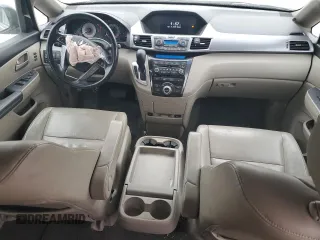 2012 Honda Odyssey Touring with VIN 5FNRL5H9XCB078399, listed as a Copart auction lot 52360165 with 174,819 mi miles and Salvage Title. Bid and sale history available at DreamBid. Image 8.