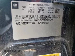 2012 Buick LaCrosse Touring z VIN 1G4GJ5E30CF227634, wystawiony jako Copart lot #61255525 z przebiegiem 133 759 mil mil oraz Szkoda całkowita • Salvage title. Historia ofert i sprzedaży dostępna na DreamBid. Obrazek 13.