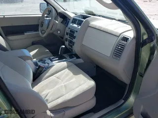 2009 Mercury Mariner Hybrid with VIN 4M2CU29329KJ21523, listed as a IAAI auction lot 41876791 with 173,359 mi miles. Bid and sale history available at carsss.com. Image 5.