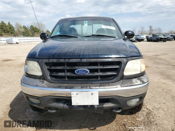 1999 Ford F-150 with VIN 1FTRX18W1XKC00918, listed as a Copart auction lot 53830305 with 205,205 mi miles and Salvage title. Bid and sale history available at DreamBid. Image 5.