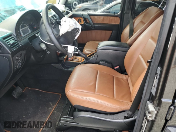 2004 Mercedes-Benz G with VIN WDCYR46E74X144672, listed as a Copart auction lot 55212454 with 143,994 mi miles and Salvage Title. Bid and sale history available at DreamBid. Image 7.