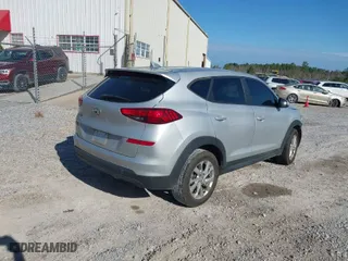 2019 Hyundai Tucson SE with VIN KM8J23A47KU842987, listed as a IAAI auction lot 41691898 with 125,821 mi miles. Bid and sale history available at carsss.com. Image 4.