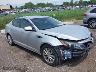 2014 Kia Optima EX with VIN 5XXGN4A79EG339431, listed as a IAAI auction lot 39792297 with 101,446 mi miles. Bid and sale history available at carsss.com. Image 1.