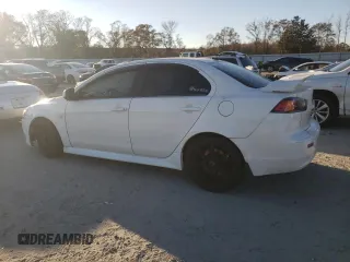 2014 Mitsubishi Lancer GT with VIN JA32U8FW7EU009901, listed as a Copart auction lot 82544214 with 139,691 mi miles and Salvage Title. Bid and sale history available at carsss.com. Image 2.