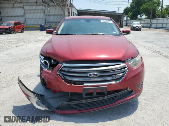 2014 Ford Taurus SEL z VIN 1FAHP2E83EG153033, wystawiony jako Copart lot #55400835 z przebiegiem 96 612 mil mil oraz Szkoda całkowita • Salvage title. Historia ofert i sprzedaży dostępna na DreamBid. Obrazek 5.